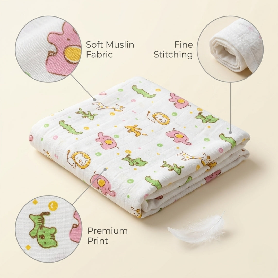 Newborn baby wrapped in soft organic muslin swaddle blanket with animal design