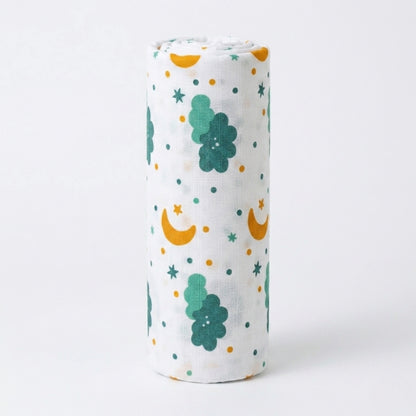 Rolled-up swaddle with moon, star, and flower patterns on a white background