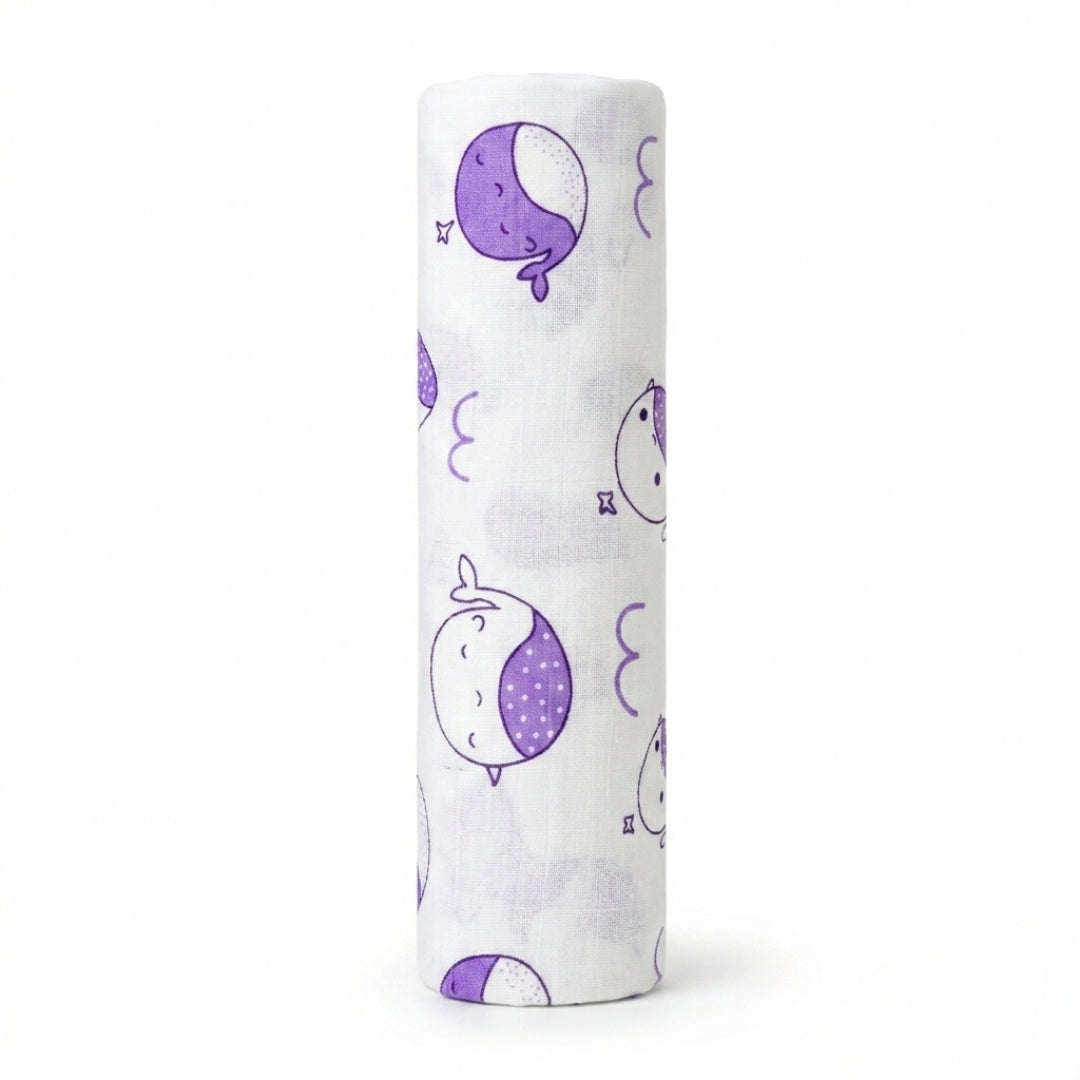 Organic muslin cotton swaddle blanket with animal print by Lazytoddler