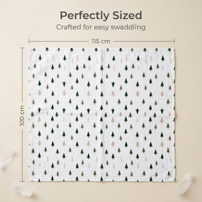 Baby blanket with tree pattern and measurements on a beige background